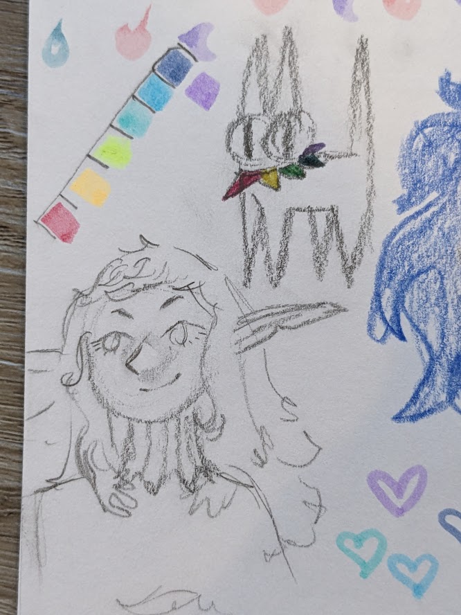 a photo of two sketches, one is a triangular and simplistic cat with a bright rainbow jester's collar, and the other is of Fleki from dungeon meshi looking content.